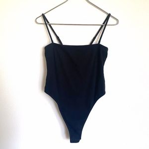 "Inamorata" "Canal" Black ribbed bodysuit